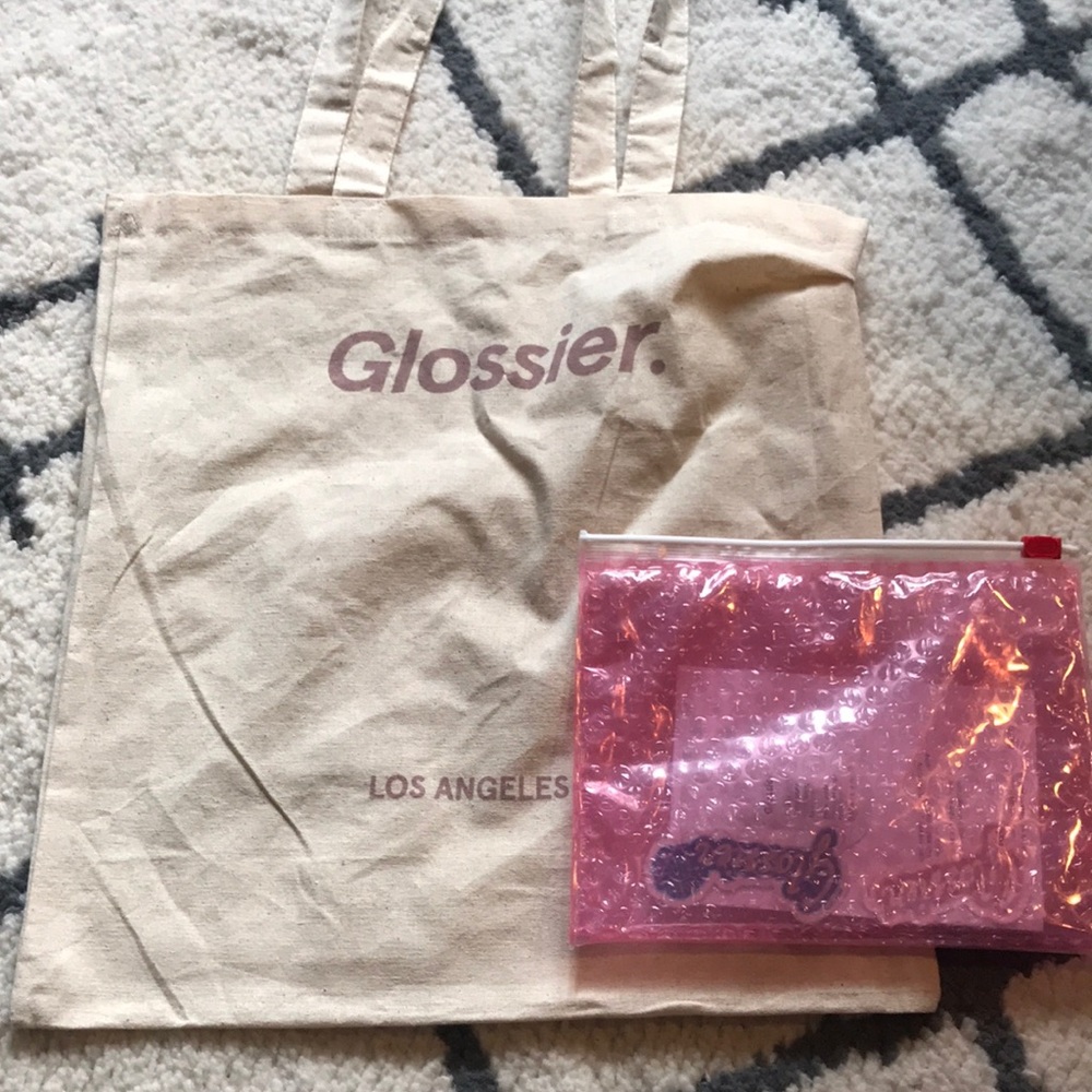 Glossier tote bag and stickers